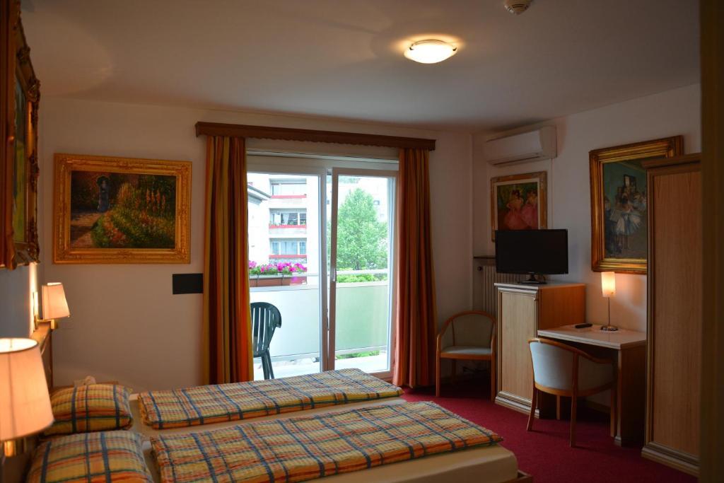 Hotel Dischma - Free Bus And Train Ticket Paradiso Ruang foto