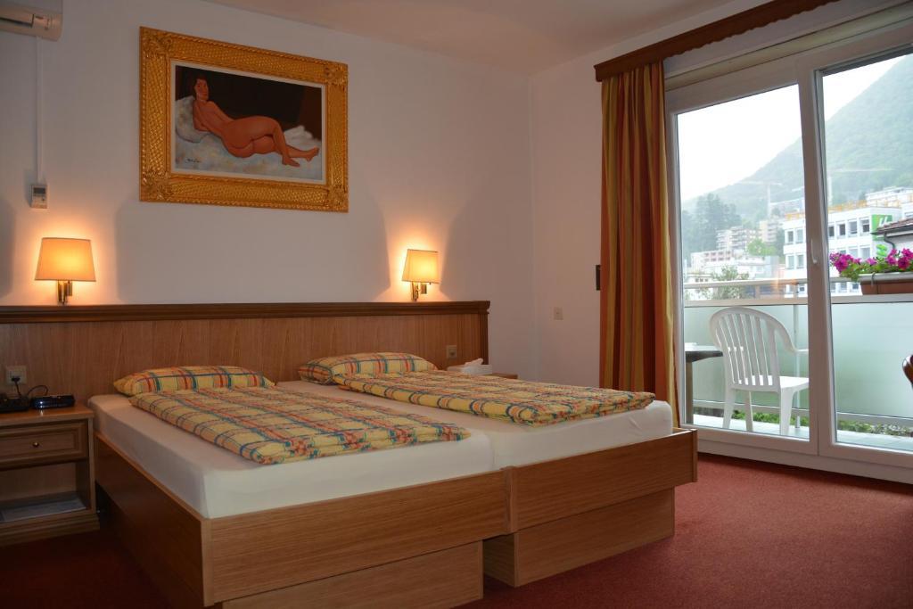 Hotel Dischma - Free Bus And Train Ticket Paradiso Ruang foto