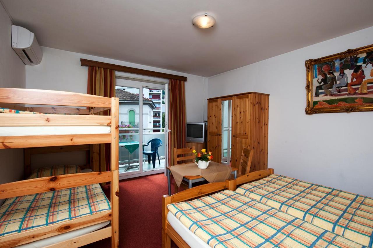 Hotel Dischma - Free Bus And Train Ticket Paradiso Ruang foto